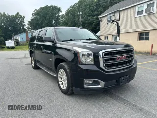 2016 GMC Yukon XL SLT with VIN 1GKS2GKC2GR180580, listed as a Copart auction lot 66899234 with 243,232 mi miles and Clean Title. Bid and sale history available at carsss.com. Image 4.
