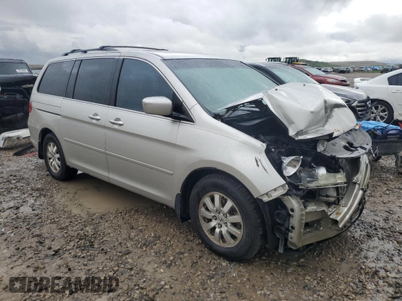 2008 Honda Odyssey EX-L with VIN 5FNRL38628B414581, listed as a Copart auction lot 52548104 with 236,692 mi miles and Salvage Title. Bid and sale history available at DreamBid. Image 4.