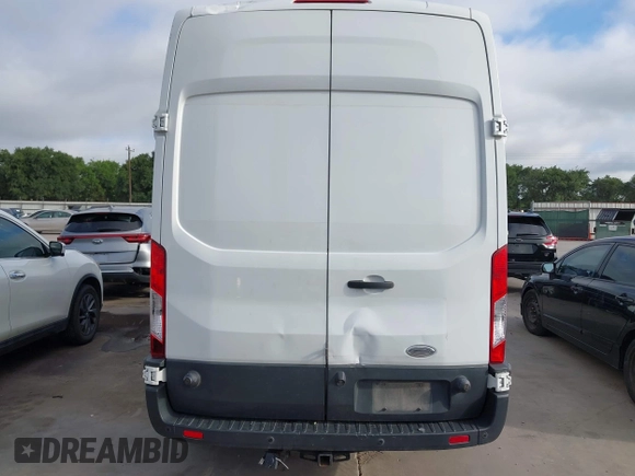 2015 Ford Transit z VIN 1FTSW2XM2FKA02969, wystawiony jako IAAI lot #42515290 z przebiegiem 166 292 mil mil oraz . Historia ofert i sprzedaży dostępna na DreamBid. Obrazek 15.