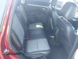 2017 Ford Escape SE z VIN 1FMCU9GD4HUA10240, wystawiony jako IAAI lot #42392522 z przebiegiem 82 325 mil mil oraz . Historia ofert i sprzedaży dostępna na DreamBid. Obrazek 8.