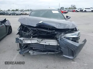 2024 Lexus ES 300h with VIN 58ABA1C18RU039512, listed as a IAAI auction lot 42051732 with 19,728 mi miles and . Bid and sale history available at DreamBid. Image 12.