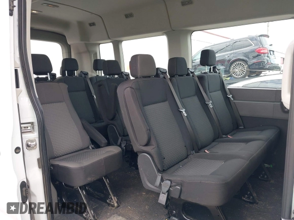 2023 Ford Transit Passenger XL with VIN 1FBAX2C80PKA94008, listed as a IAAI auction lot 42007461 with 35,553 mi miles and . Bid and sale history available at DreamBid. Image 8.