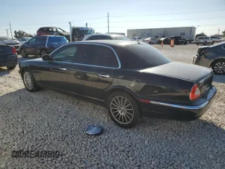 2006 Jaguar XJ with VIN SAJWA79B66SH07528, listed as a Copart auction lot 80396994 with 114,922 mi miles and Clean Title. Bid and sale history available at carsss.com. Image 2.