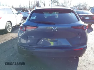 2023 Mazda CX-30 S Carbon Edition with VIN 3MVDMBCM3PM579345, listed as a IAAI auction lot 41689892 with 18,621 mi miles and . Bid and sale history available at DreamBid. Image 16.