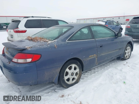 1999 Toyota Solara SE with VIN 2T1CF22P0XC131964, listed as a IAAI auction lot 41573319 with 249,870 mi miles. Bid and sale history available at carsss.com. Image 4.