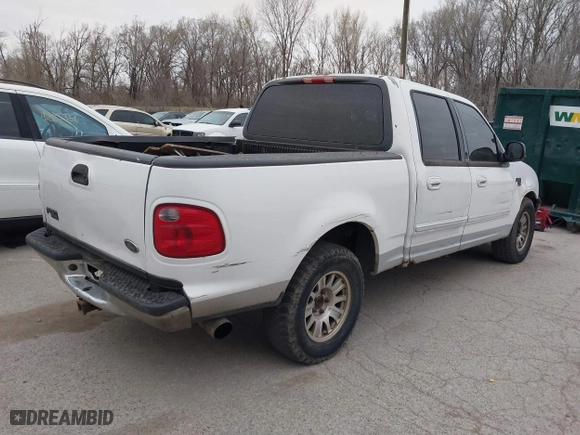 2001 Ford F-150 SuperCrew XLT with VIN 1FTRW07L61KB49220, listed as a IAAI auction lot 41826223 with 281,547 mi miles. Bid and sale history available at carsss.com. Image 4.