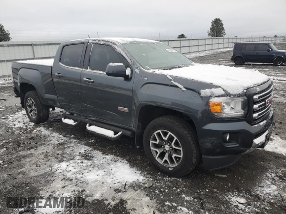 2015 GMC Canyon 4WD SLE with VIN 1GTG6BE33F1115979, listed as a Copart auction lot 41680415 with 155,346 mi miles and Salvage Title. Bid and sale history available at carsss.com. Image 4.