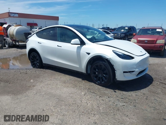 2023 Tesla Model Y Long Range z VIN 7SAYGDEE9PF753051, wystawiony jako IAAI lot #39615839 z przebiegiem Nie podano mil oraz . Historia ofert i sprzedaży dostępna na DreamBid. Obrazek 1.