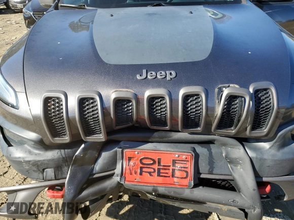 2018 Jeep Cherokee Trailhawk with VIN 1C4PJMBB9JD548008, listed as a Copart auction lot 43076075 with 61,906 mi miles and Salvage title. Bid and sale history available at DreamBid. Image 12.