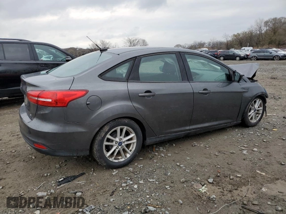 2018 Ford Focus SE with VIN 1FADP3F29JL206477, listed as a Copart auction lot 50410345 with 70,955 mi miles and Salvage Title. Bid and sale history available at DreamBid. Image 3.