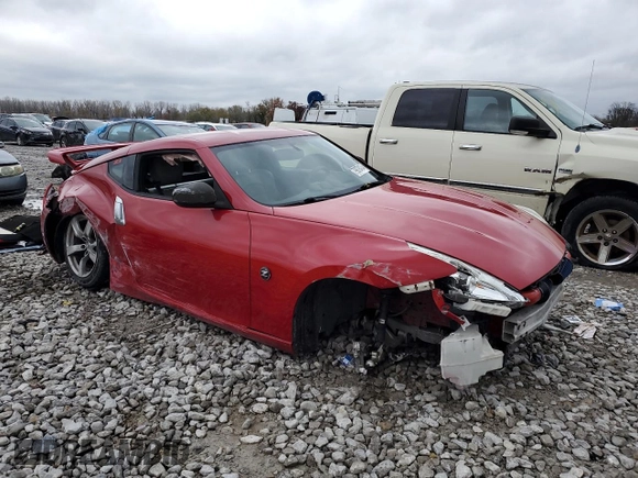 2009 Nissan 370Z z VIN JN1AZ44E19M400603, wystawiony jako Copart lot #79878474 z przebiegiem 129 976 mil mil oraz Szkoda całkowita • Salvage title. Historia ofert i sprzedaży dostępna na DreamBid. Obrazek 4.