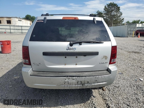 2005 Jeep Grand Cherokee Laredo with VIN 1J4GR48KX5C565762, listed as a Copart auction lot 63080115 with 122,349 mi miles and Salvage title. Bid and sale history available at DreamBid. Image 6.