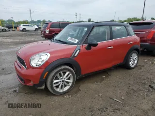 2013 MINI Countryman S with VIN WMWZC3C57DWP22816, listed as a Copart auction lot 58988035 with 77,107 mi miles and Salvage title. Bid and sale history available at DreamBid. Image 1.