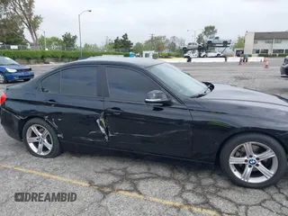 2014 BMW 3 Series 320i with VIN WBA3B1G57ENS80800, listed as a IAAI auction lot 42097683 with 152,924 mi miles. Bid and sale history available at carsss.com. Image 6.