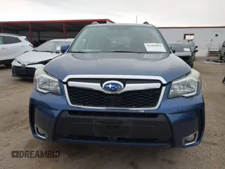 2014 Subaru Forester XT Touring with VIN JF2SJGMC9EH428341, listed as a IAAI auction lot 41185804 with 111,000 mi miles and . Bid and sale history available at DreamBid. Image 12.