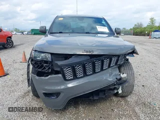 2021 Jeep Grand Cherokee Laredo E with VIN 1C4RJFAG4MC700384, listed as a IAAI auction lot 42192672 with 54,525 mi miles and . Bid and sale history available at DreamBid. Image 13.
