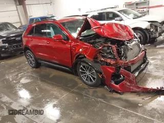 2024 Cadillac XT4 AWD Sport with VIN 1GYFZFR42RF154352, listed as a IAAI auction lot 41249916 with 27,378 mi miles and . Bid and sale history available at DreamBid. Image 1.