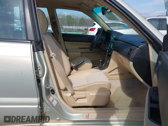 2006 Subaru Forester 2.5 X with VIN JF1SG63636H705351, listed as a IAAI auction lot 41957115 with 206,418 mi miles. Bid and sale history available at carsss.com. Image 5.