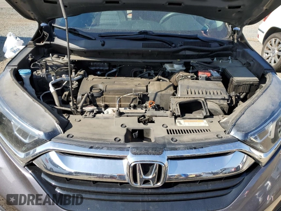 2019 Honda CR-V LX with VIN 2HKRW5H38KH418961, listed as a Copart auction lot 50594165 with 81,425 mi miles and Salvage Title. Bid and sale history available at DreamBid. Image 12.