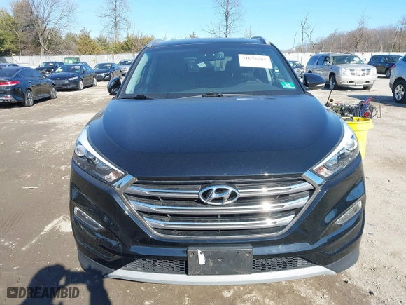 2018 Hyundai Tucson Value with VIN KM8J3CA26JU700642, listed as a IAAI auction lot 41655085 with 80,903 mi miles. Bid and sale history available at carsss.com. Image 12.