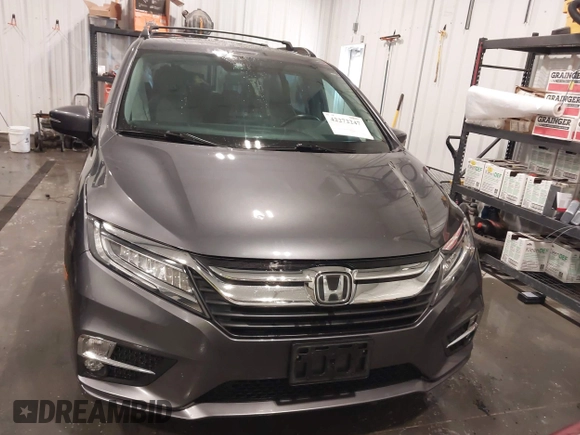 2018 Honda Odyssey Touring with VIN 5FNRL6H84JB041309, listed as a IAAI auction lot 42272247 with 90,371 mi miles and . Bid and sale history available at DreamBid. Image 12.