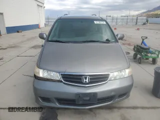 2002 Honda Odyssey EX z VIN 5FNRL18652B014929, wystawiony jako Copart lot #57185775 z przebiegiem 291 807 mil mil oraz Czysty tytuł • Clean title. Historia ofert i sprzedaży dostępna na DreamBid. Obrazek 5.