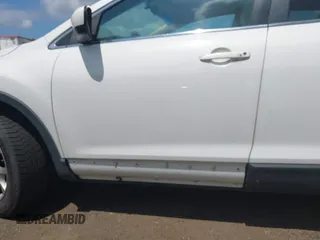 2014 Mazda CX-9 Touring z VIN JM3TB3CV7E0426900, wystawiony jako IAAI lot #42796725 z przebiegiem Nie podano mil oraz . Historia ofert i sprzedaży dostępna na DreamBid. Obrazek 6.