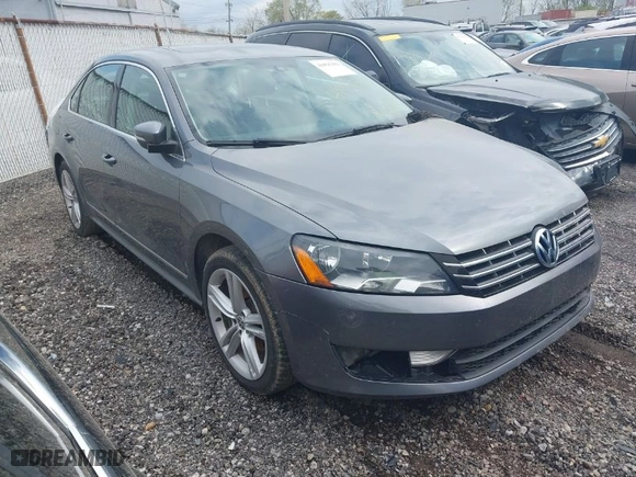 2014 Volkswagen Passat TDI SE w/Sunroof with VIN 1VWBN7A39EC085032, listed as a IAAI auction lot 41931302 with 193,425 mi miles. Bid and sale history available at carsss.com. Image 1.