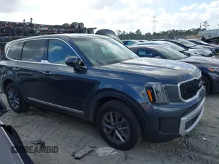 2024 Kia Telluride LX z VIN 5XYP24GC4RG542225, wystawiony jako IAAI lot #40726805 z przebiegiem 9 285 mil mil oraz . Historia ofert i sprzedaży dostępna na DreamBid. Obrazek 13.