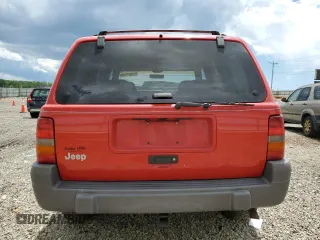 1997 Jeep Grand Cherokee Laredo with VIN 1J4GZ58S3VC739922, listed as a Copart auction lot 55667885 with 209,075 mi miles and Salvage title. Bid and sale history available at DreamBid. Image 6.