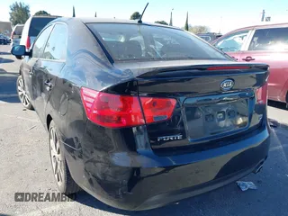 2012 Kia Forte SX with VIN KNAFW4A32C5623357, listed as a IAAI auction lot 41324098 with 217,354 mi miles. Bid and sale history available at carsss.com. Image 3.