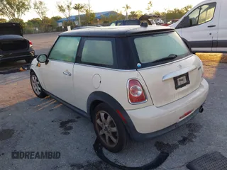 2011 MINI Hardtop with VIN WMWSU3C58BT097825, listed as a IAAI auction lot 42040442 with 141,978 mi miles and . Bid and sale history available at DreamBid. Image 3.