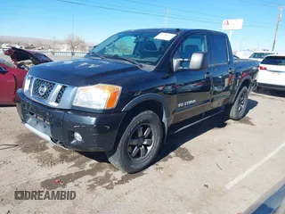 2014 Nissan Titan S with VIN 1N6AA0EC6EN506928, listed as a IAAI auction lot 41380319 with 102,669 mi miles and . Bid and sale history available at DreamBid. Image 17.