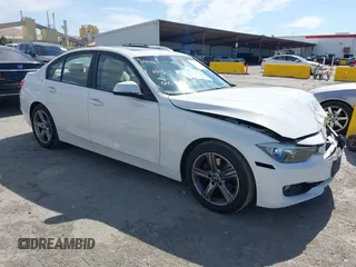 2014 BMW 3 Series 328i with VIN WBA3C1C53EK115749, listed as a IAAI auction lot 42425317 with 130,464 mi miles and . Bid and sale history available at DreamBid. Image 1.