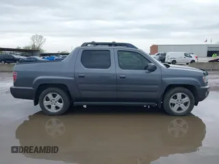 2014 Honda Ridgeline RTL with VIN 5FPYK1F50EB002577, listed as a IAAI auction lot 41931258 with 147,665 mi miles. Bid and sale history available at carsss.com. Image 13.