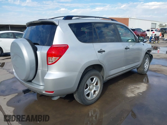 2007 Toyota RAV4 with VIN JTMZK33V876006923, listed as a IAAI auction lot 41406204 with 121,425 mi miles. Bid and sale history available at carsss.com. Image 4.