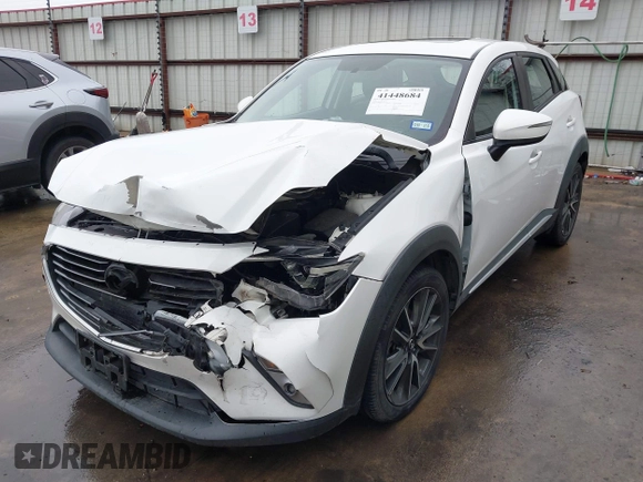 2016 Mazda CX-3 Grand Touring with VIN JM1DKBD73G0124742, listed as a IAAI auction lot 41448684 with 96,322 mi miles. Bid and sale history available at carsss.com. Image 2.