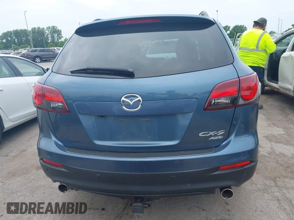 2015 Mazda CX-9 Touring with VIN JM3TB3CV9F0463819, listed as a IAAI auction lot 42506237 with 207,418 mi miles and . Bid and sale history available at DreamBid. Image 16.