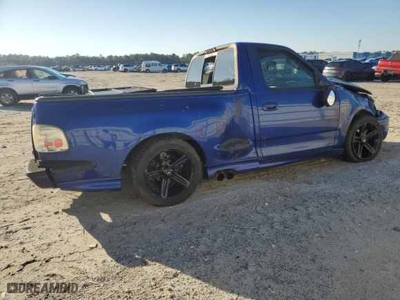 2004 Ford F-150 Heritage Lightning with VIN 2FTRF07394CA62825, listed as a Copart auction lot 45794935 with 117,044 mi miles and Salvage Title. Bid and sale history available at carsss.com. Image 3.