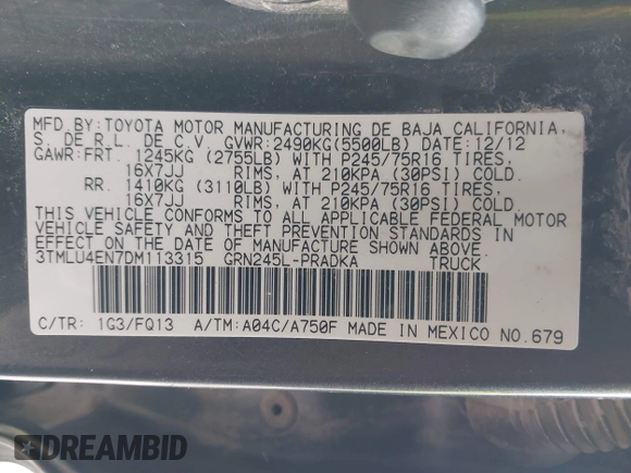 2013 Toyota Tacoma with VIN 3TMLU4EN7DM113315, listed as a IAAI auction lot 41938415 with 228,912 mi miles and . Bid and sale history available at DreamBid. Image 9.