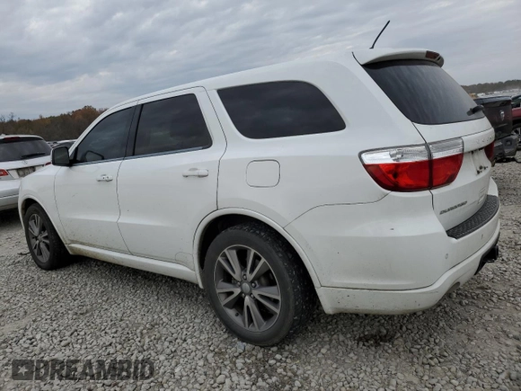 2013 Dodge Durango R/T with VIN 1C4SDHCT0DC648668, listed as a Copart auction lot 83211194 with 149,649 mi miles and Salvage title. Bid and sale history available at DreamBid. Image 2.