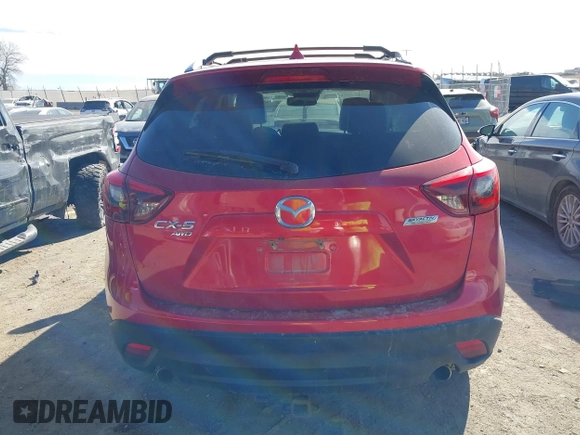 2016 Mazda CX-5 Grand Touring with VIN JM3KE4DY0G0709563, listed as a IAAI auction lot 41886956 with 156,769 mi miles. Bid and sale history available at carsss.com. Image 17.