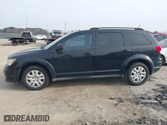 2013 Dodge Journey SE with VIN 3C4PDCAB0DT702977, listed as a IAAI auction lot 41797817 with 150,317 mi miles. Bid and sale history available at carsss.com. Image 12.