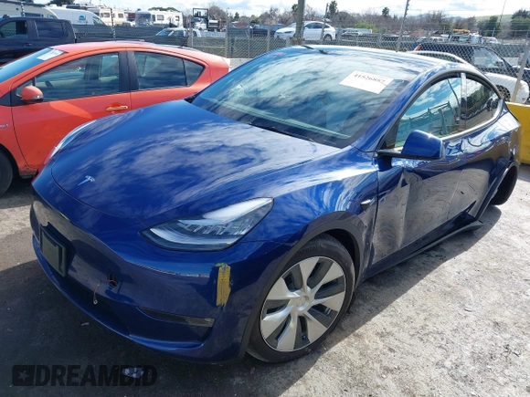 2022 Tesla Model Y Long Range with VIN 7SAYGDEE6NF318372, listed as a IAAI auction lot 41526857 with 26,083 mi miles and . Bid and sale history available at carsss.com. Image 2.