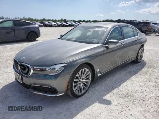 2018 BMW 7 Series 740i xDrive with VIN WBA7E4C51JGV23905, listed as a Copart auction lot 46949643 with 33,842 mi miles. Bid and sale history available at carsss.com. Image 1.