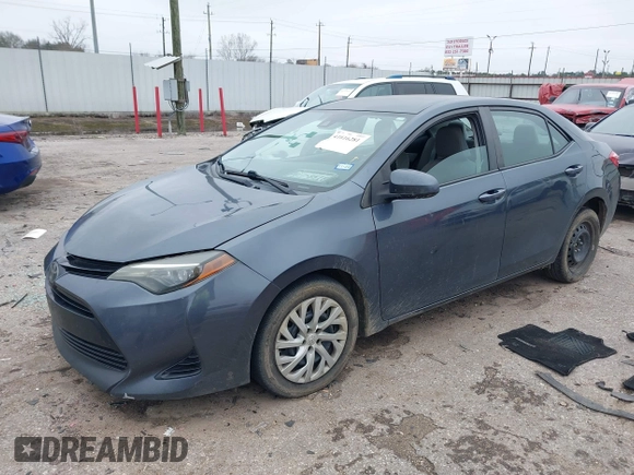 2018 Toyota Corolla L z VIN 5YFBURHE8JP762341, wystawiony jako IAAI lot #41616281 z przebiegiem 141 882 mil mil oraz . Historia ofert i sprzedaży dostępna na DreamBid. Obrazek 17.