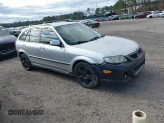 2002 Mazda Protege with VIN JM1BJ245921455563, listed as a IAAI auction lot 42064853 with Not Provided miles and . Bid and sale history available at DreamBid. Image 1.