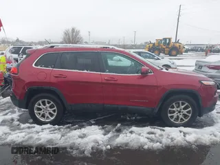 2014 Jeep Cherokee Latitude with VIN 1C4PJMCB8EW166853, listed as a IAAI auction lot 41579386 with 251,683 mi miles and . Bid and sale history available at DreamBid. Image 13.