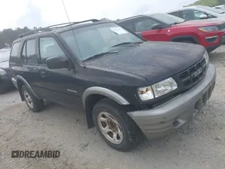 2002 Isuzu Rodeo S with VIN 4S2CK58W524322789, listed as a IAAI auction lot 41966033 with 251,311 mi miles. Bid and sale history available at carsss.com. Image 1.