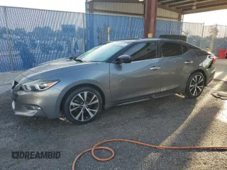 2018 Nissan Maxima SV with VIN 1N4AA6AP0JC390247, listed as a Copart auction lot 61824725 with 64,078 mi miles and Salvage title. Bid and sale history available at DreamBid. Image 1.